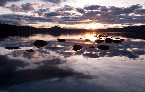 The sun sets over Waldo Lake Pete Springer