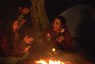 Kids around a campfire in the Ochoco Mountains