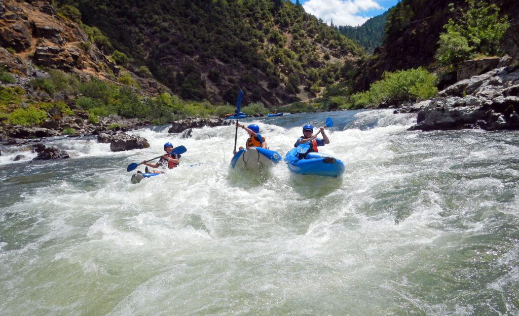 Kayakers on the Rogue River in Oregon