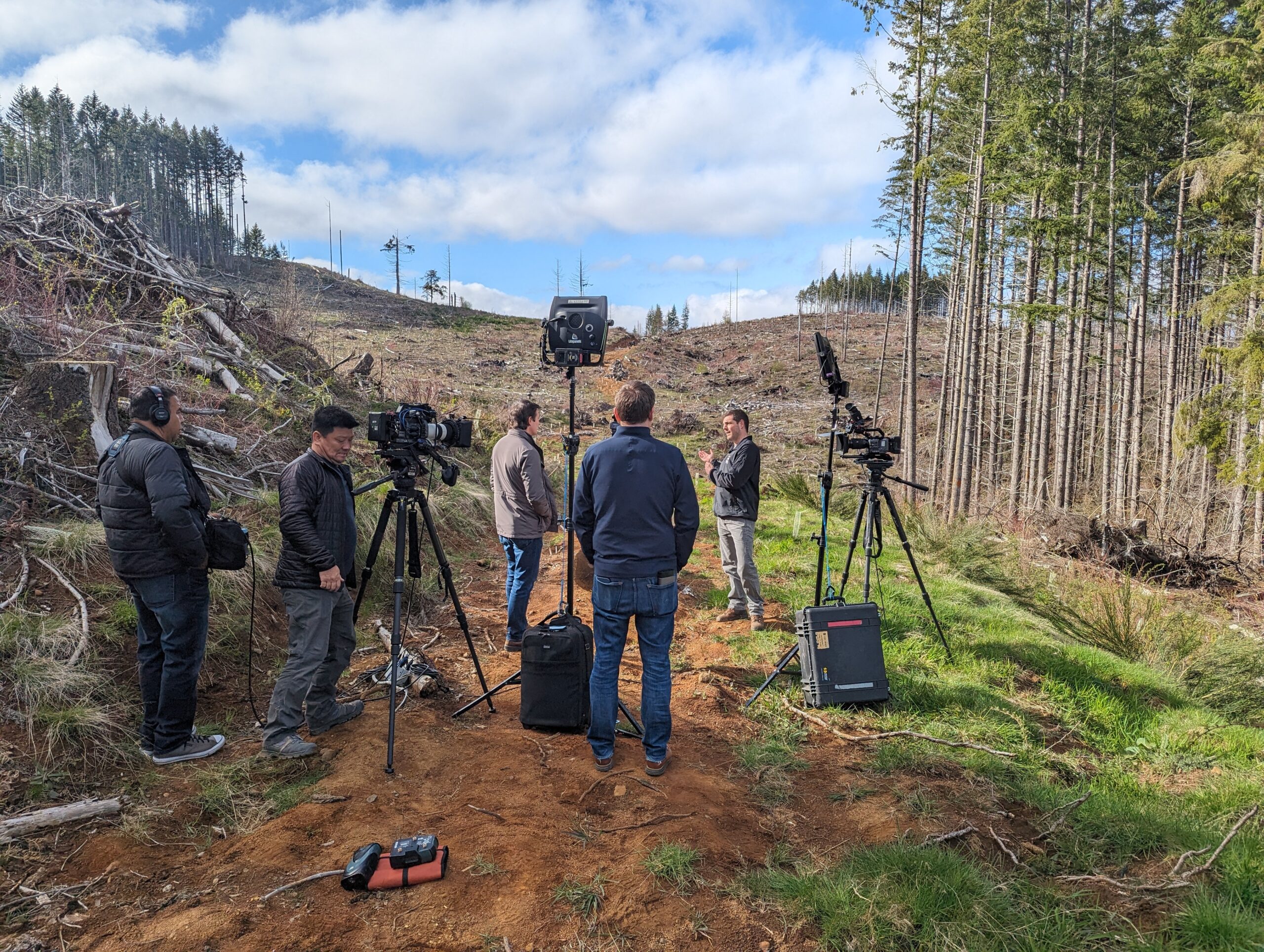 CBS crew filming Executive Director Sean Stevens at a clearcut in Oregon